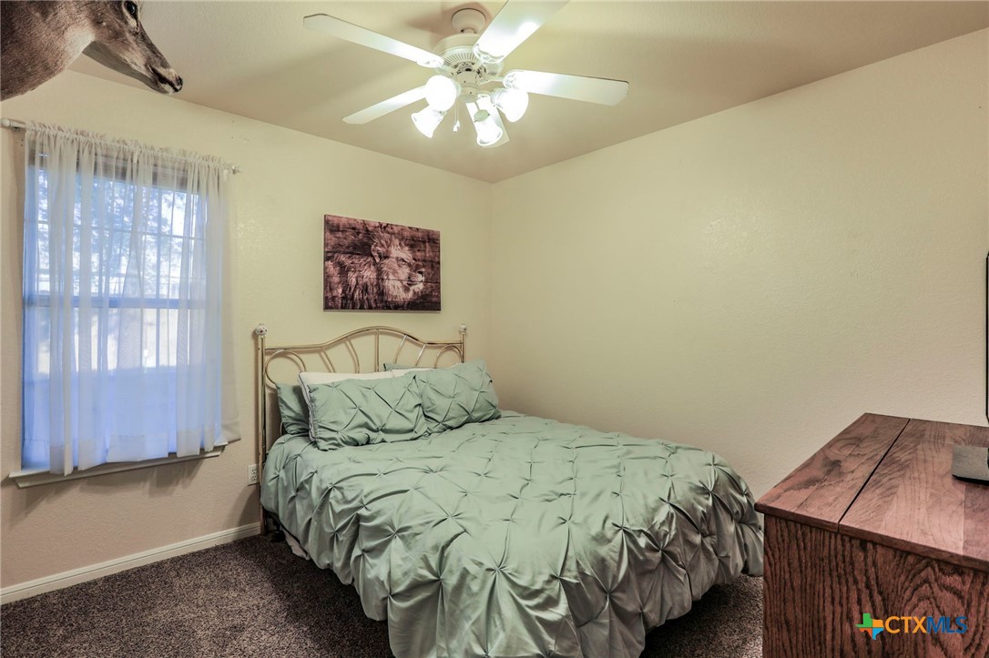 17 South Archer Drive Morgan's Point Resort, TX 76513 - Photo 18 of 30 a bedroom with a bed and a window