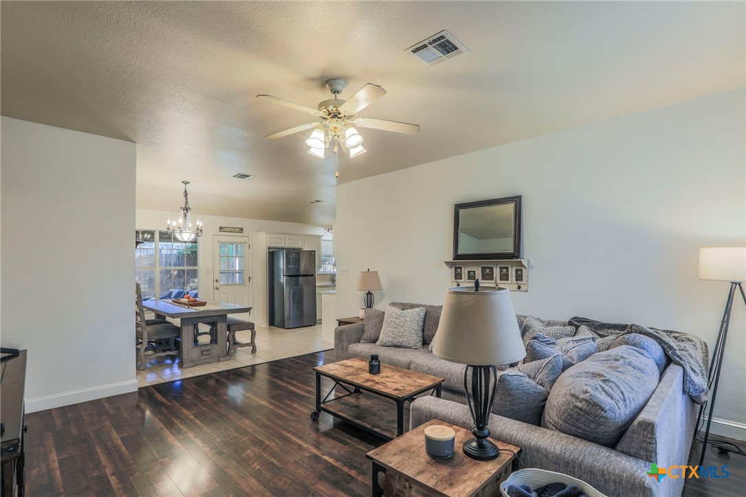17 South Archer Drive Morgan's Point Resort, TX 76513 - Photo 5 of 30 a living room with furniture and a wooden floor