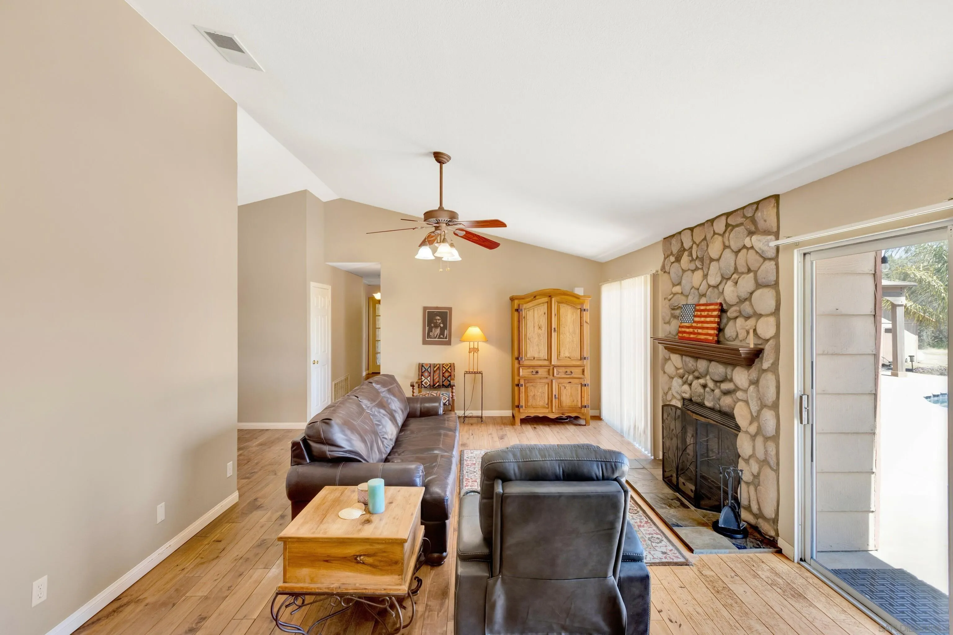 786 Rancho Trail Ramona, CA 92065 - Photo 16 of 49 a living room with furniture and a fireplace