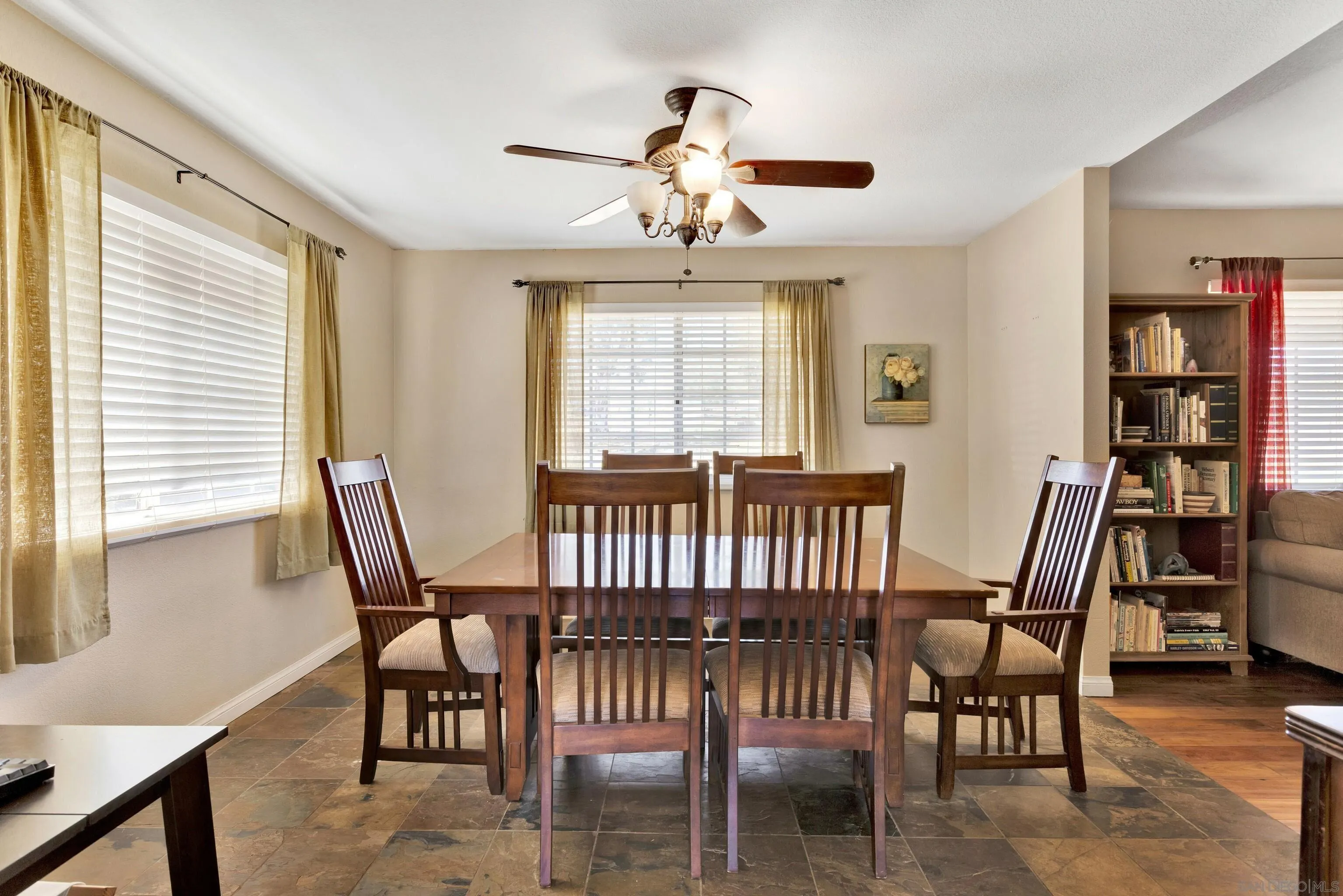 786 Rancho Trail Ramona, CA 92065 - Photo 9 of 49 a view of a dining room with furniture window and wooden floor