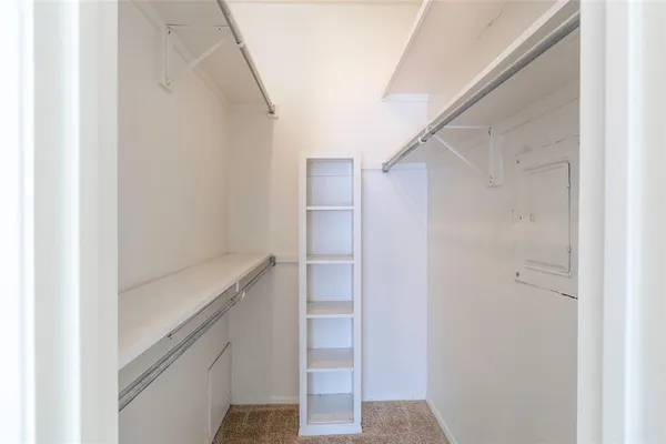 a bathroom with a shower and a sink