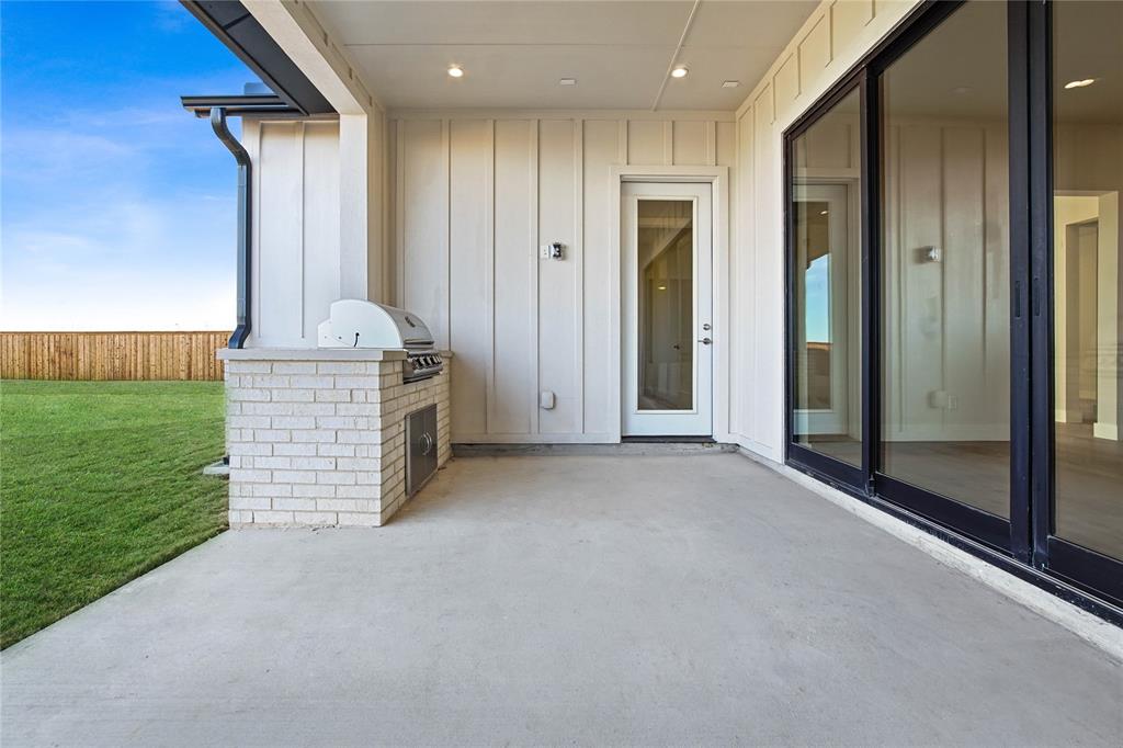 2116 Sicily Lane Haslet, TX 76052 - Photo 17 of 17 a view of an empty room with a fireplace and a fireplace