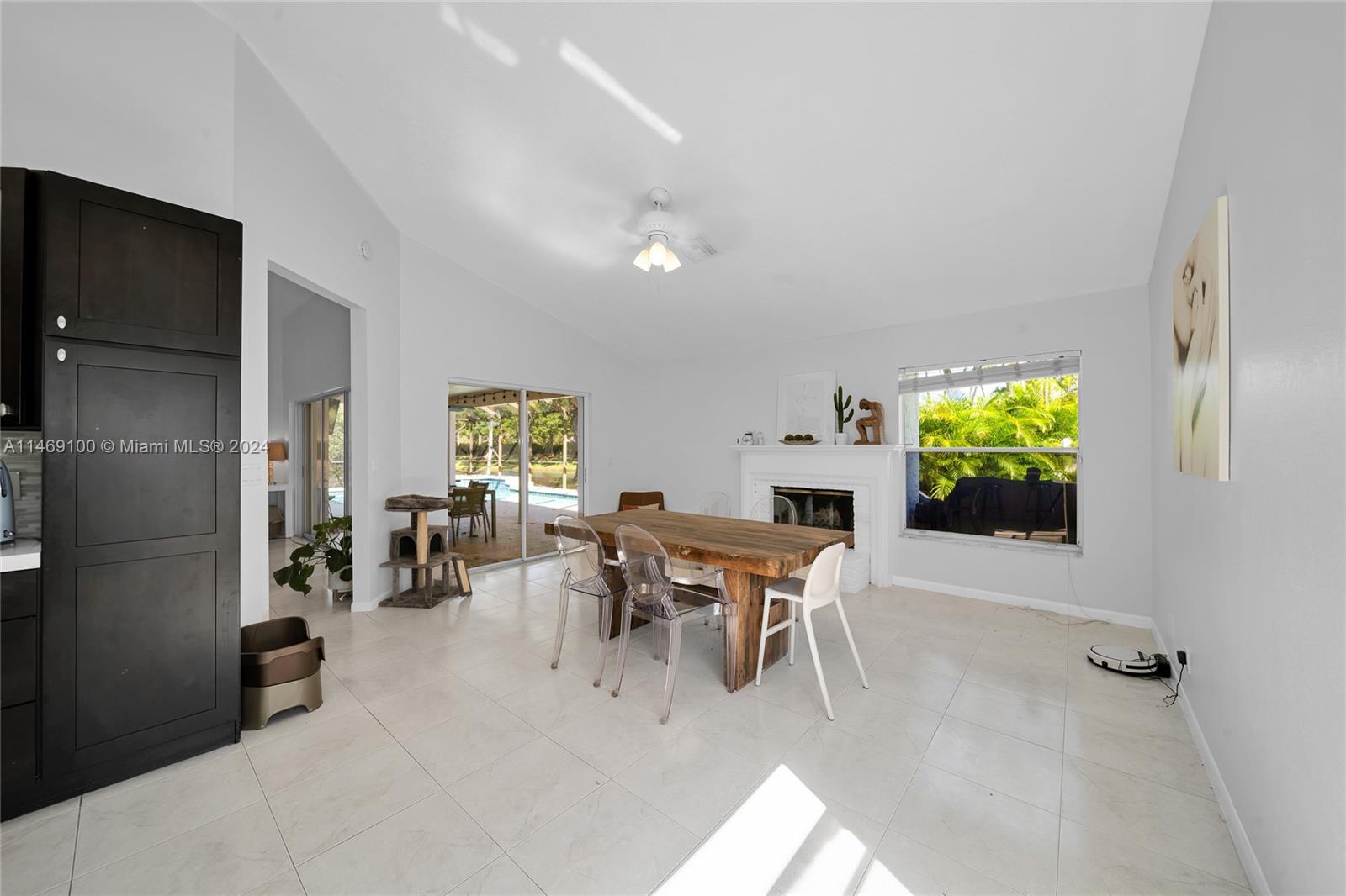12083 Rockwell Way Boca Raton, FL 33428 - Photo 12 of 47 a view of a dining room with furniture window and outside view
