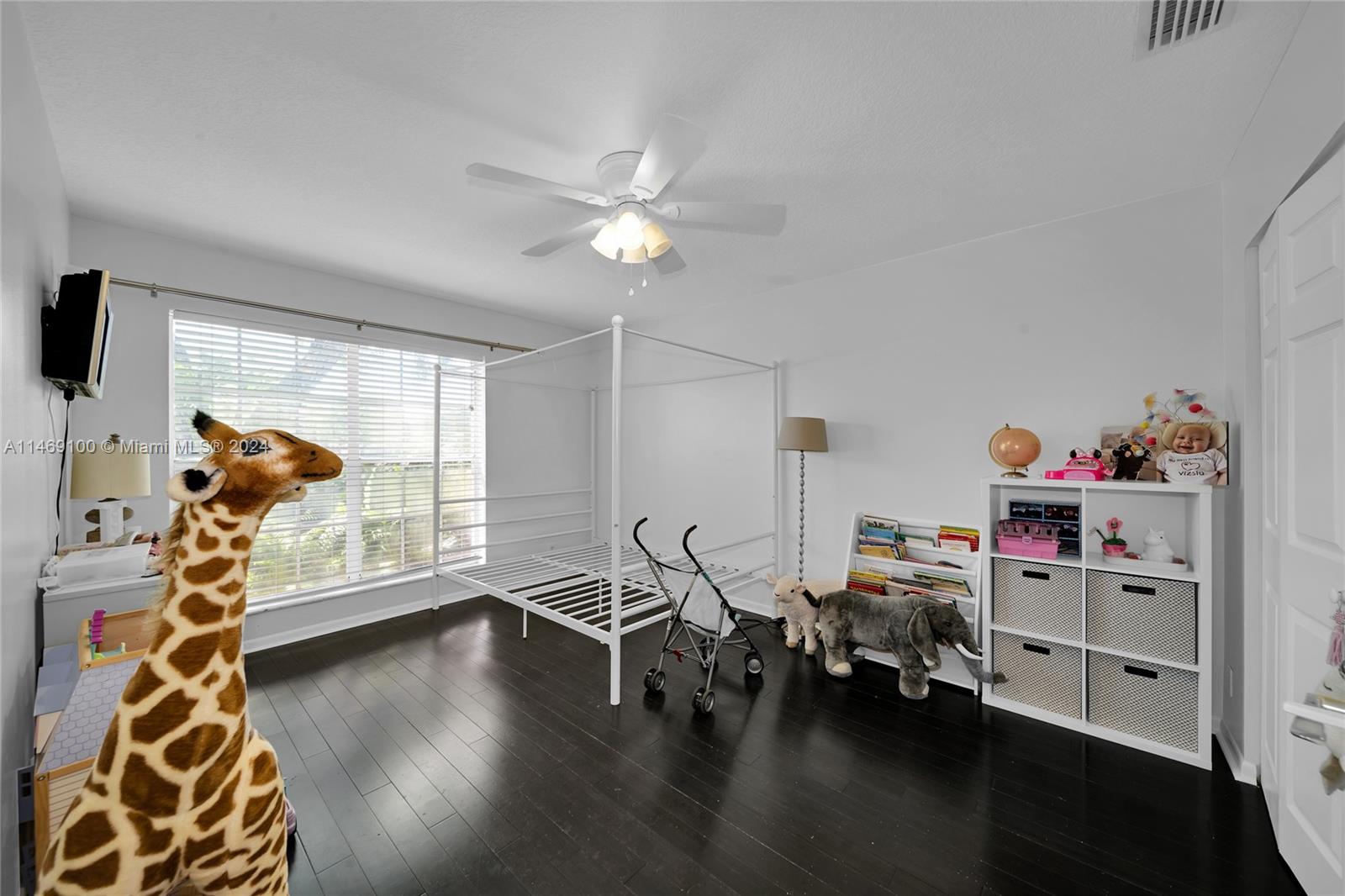 12083 Rockwell Way Boca Raton, FL 33428 - Photo 19 of 47 a view of a workspace with furniture and a window