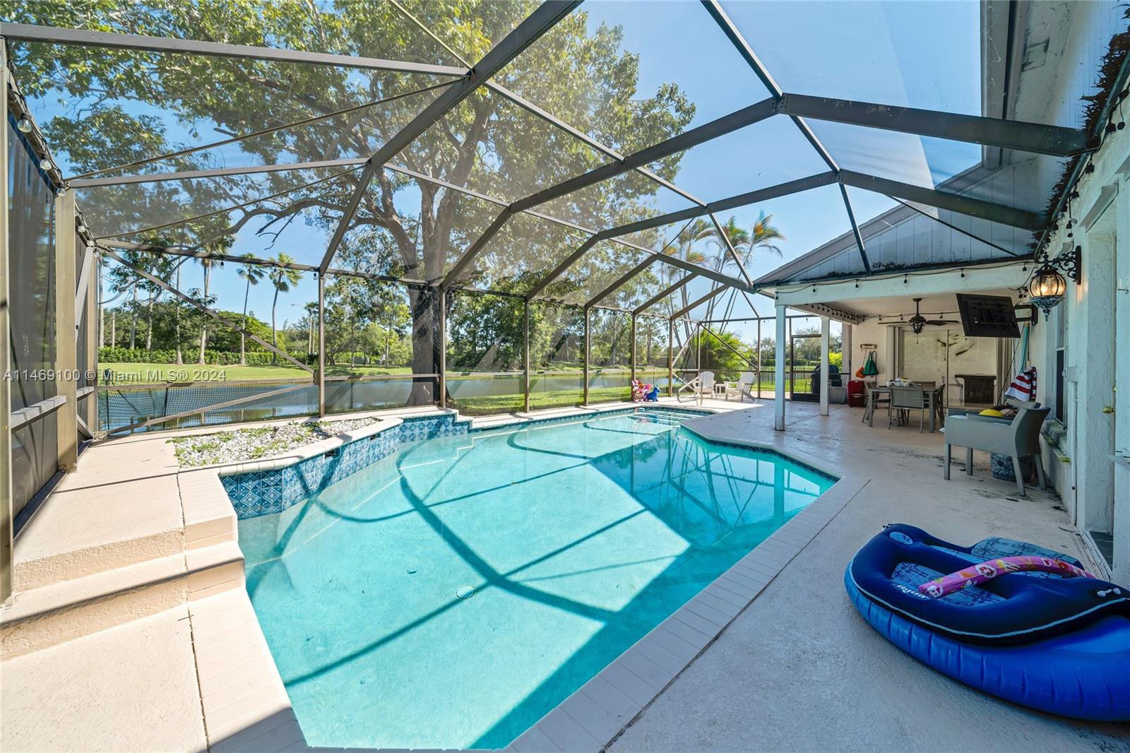 12083 Rockwell Way Boca Raton, FL 33428 - Photo 29 of 47 a view of a swimming pool with a patio
