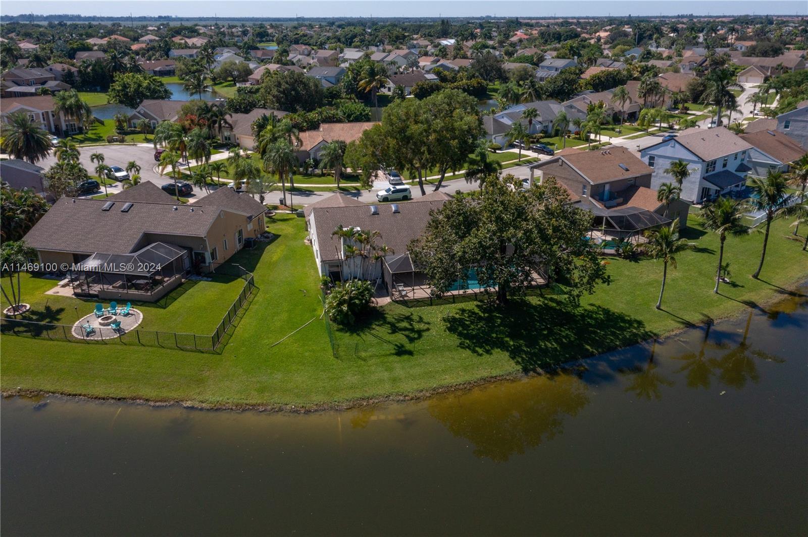 12083 Rockwell Way Boca Raton, FL 33428 - Photo 36 of 47 an aerial view of residential houses with outdoor space and lake view