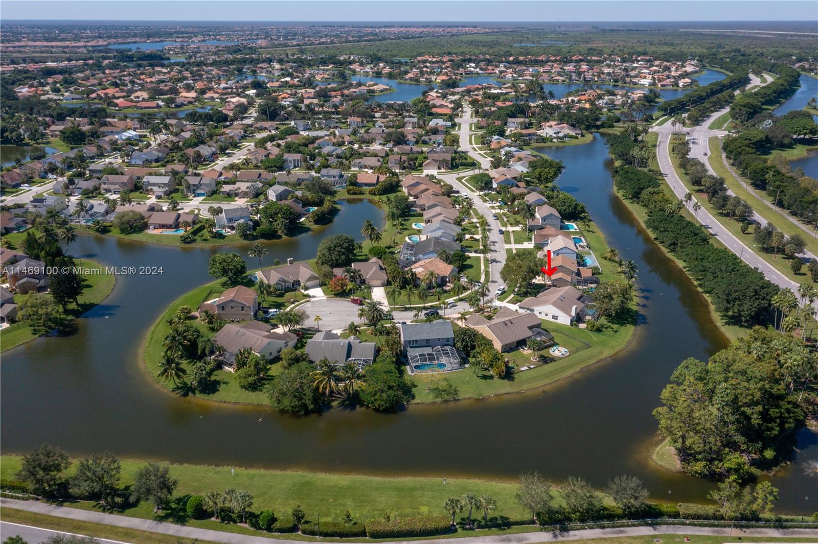 12083 Rockwell Way Boca Raton, FL 33428 - Photo 44 of 47 an aerial view of a house with a lake view