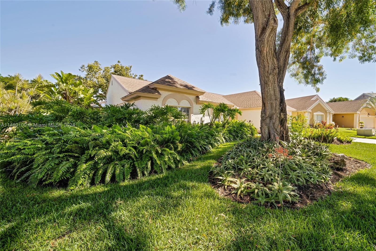 12083 Rockwell Way Boca Raton, FL 33428 - Photo 7 of 47 a view of a house with a yard