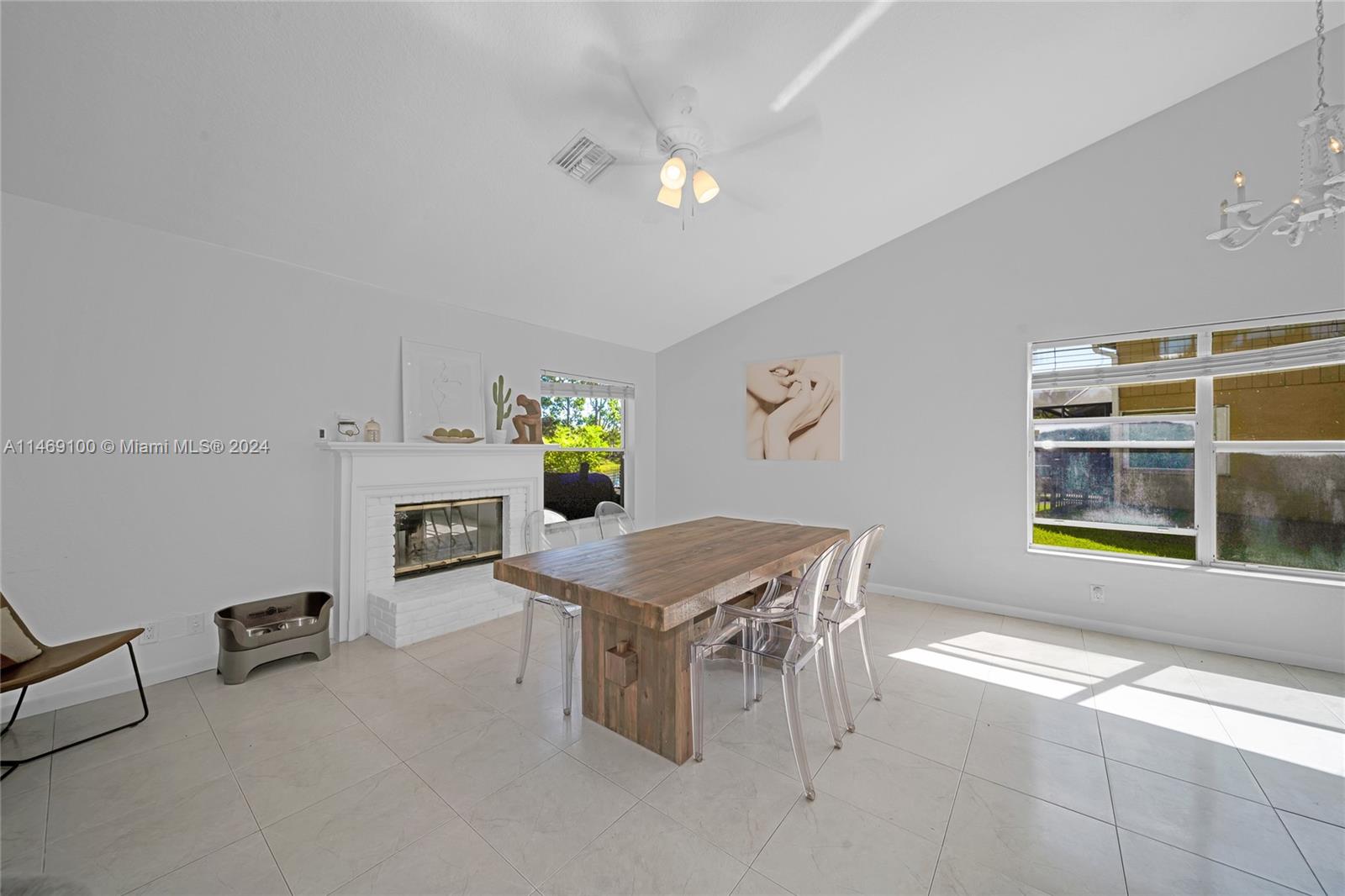 12083 Rockwell Way Boca Raton, FL 33428 - Photo 10 of 47 a room with furniture and a window