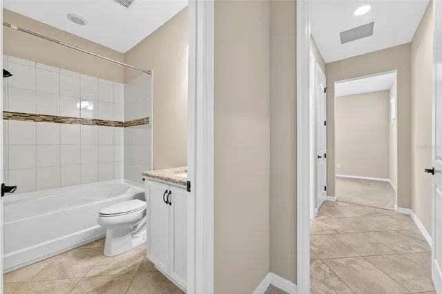 an aerial view of a city and lake view