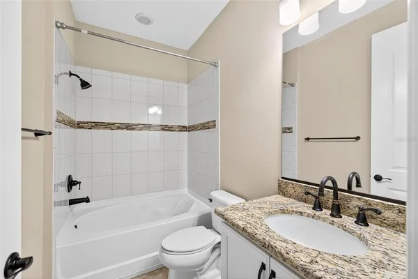 an aerial view of a house with a garden