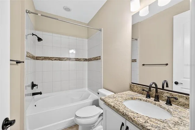 an aerial view of a house with a garden