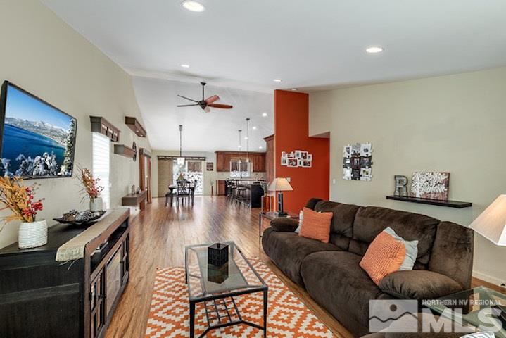 734 Gold River Court Reno, NV 89521 - Photo 1 of 21 a living room with furniture and wooden floor