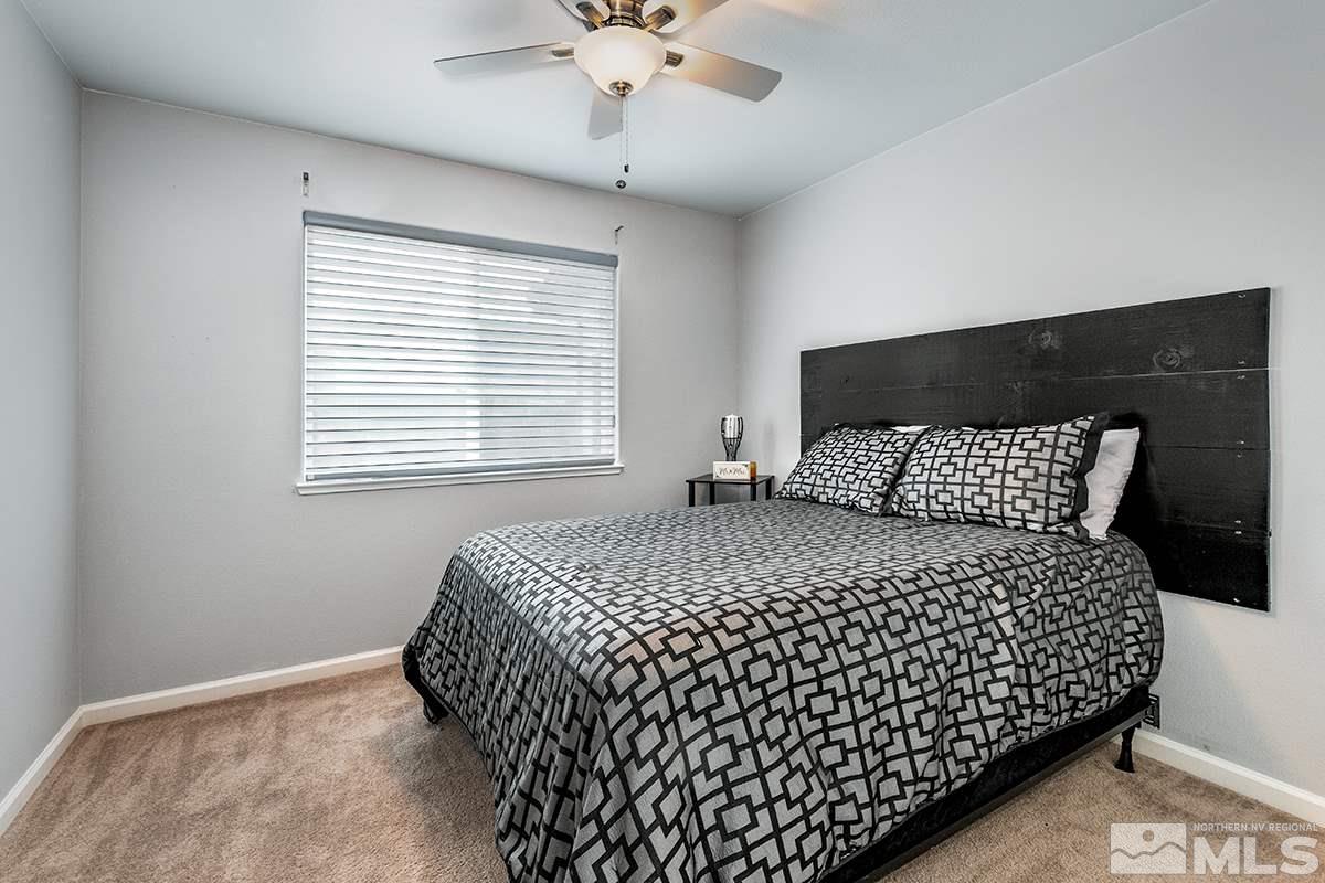 734 Gold River Court Reno, NV 89521 - Photo 15 of 21 a bedroom with a bed and window