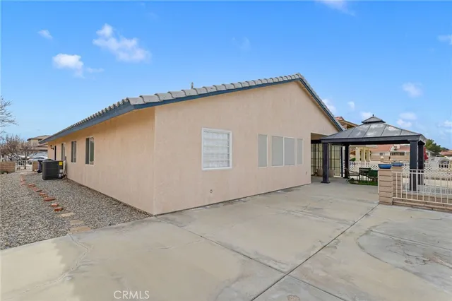 a very nice looking house with a large window