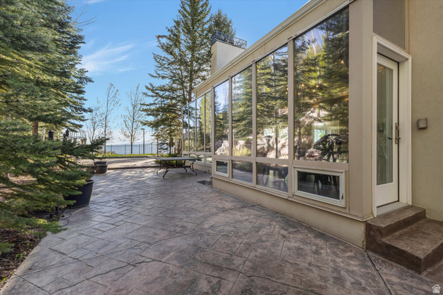 3222 Eagle View Circle Sandy, UT 84092 - Photo 40 of 60 View of patio with a sunroom and entry steps