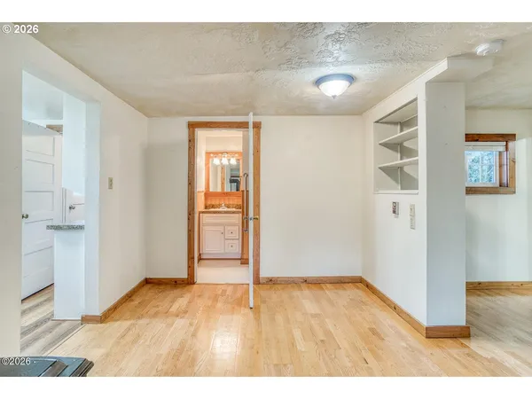 a bathroom with a granite countertop sink mirror and a