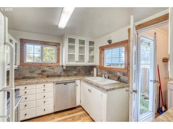 a bathroom with a sink a bathtub and a shower