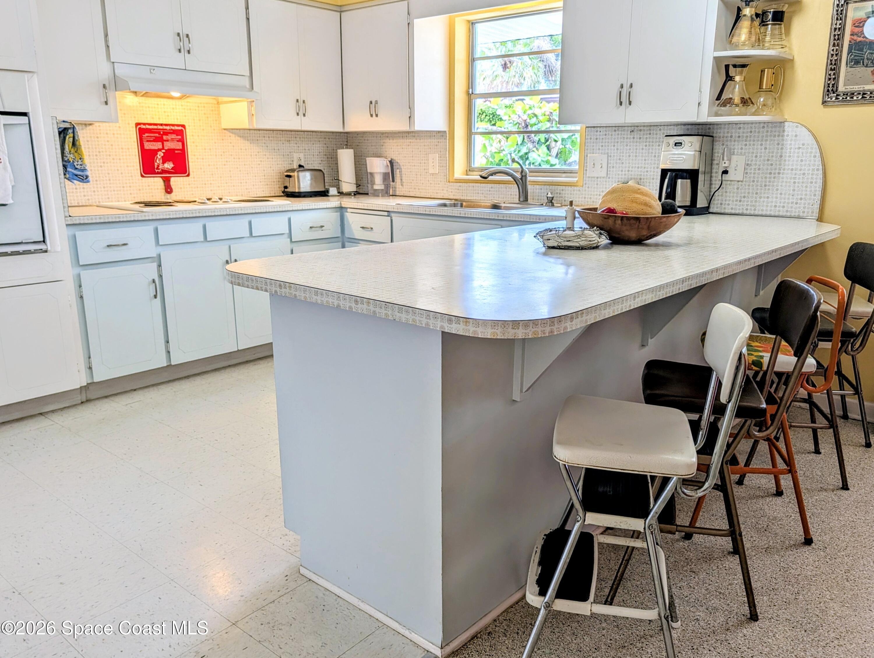615 Oak Ridge Drive Indialantic, FL 32903 - Photo 12 of 65 Breakfast Bar