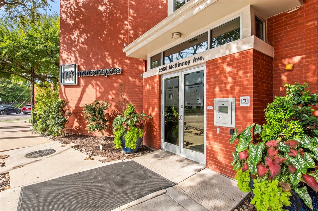 2950 McKinney Avenue, Unit 412 Dallas, TX 75204 - Photo 2 of 26 a view of a building with potted plants