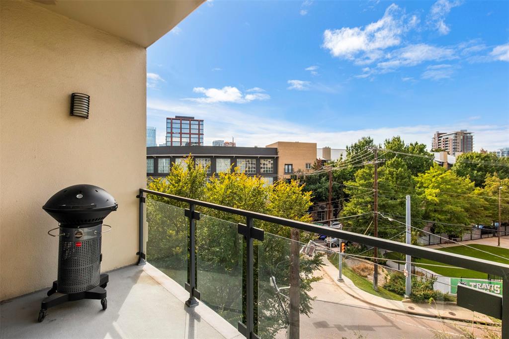 2950 McKinney Avenue, Unit 412 Dallas, TX 75204 - Photo 24 of 26 a view of a balcony with chairs