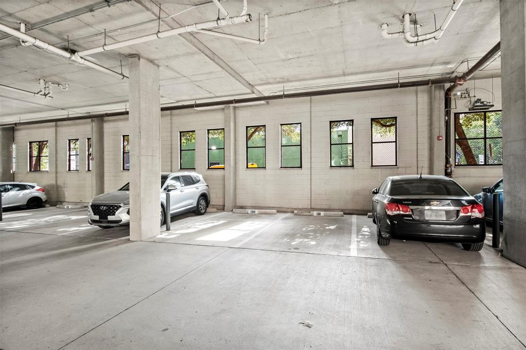 2950 McKinney Avenue, Unit 412 Dallas, TX 75204 - Photo 26 of 26 a car parked in front of house