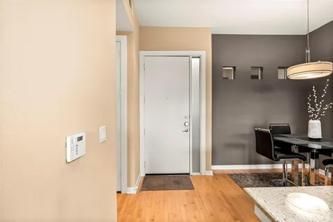 a bedroom with a bed and a table