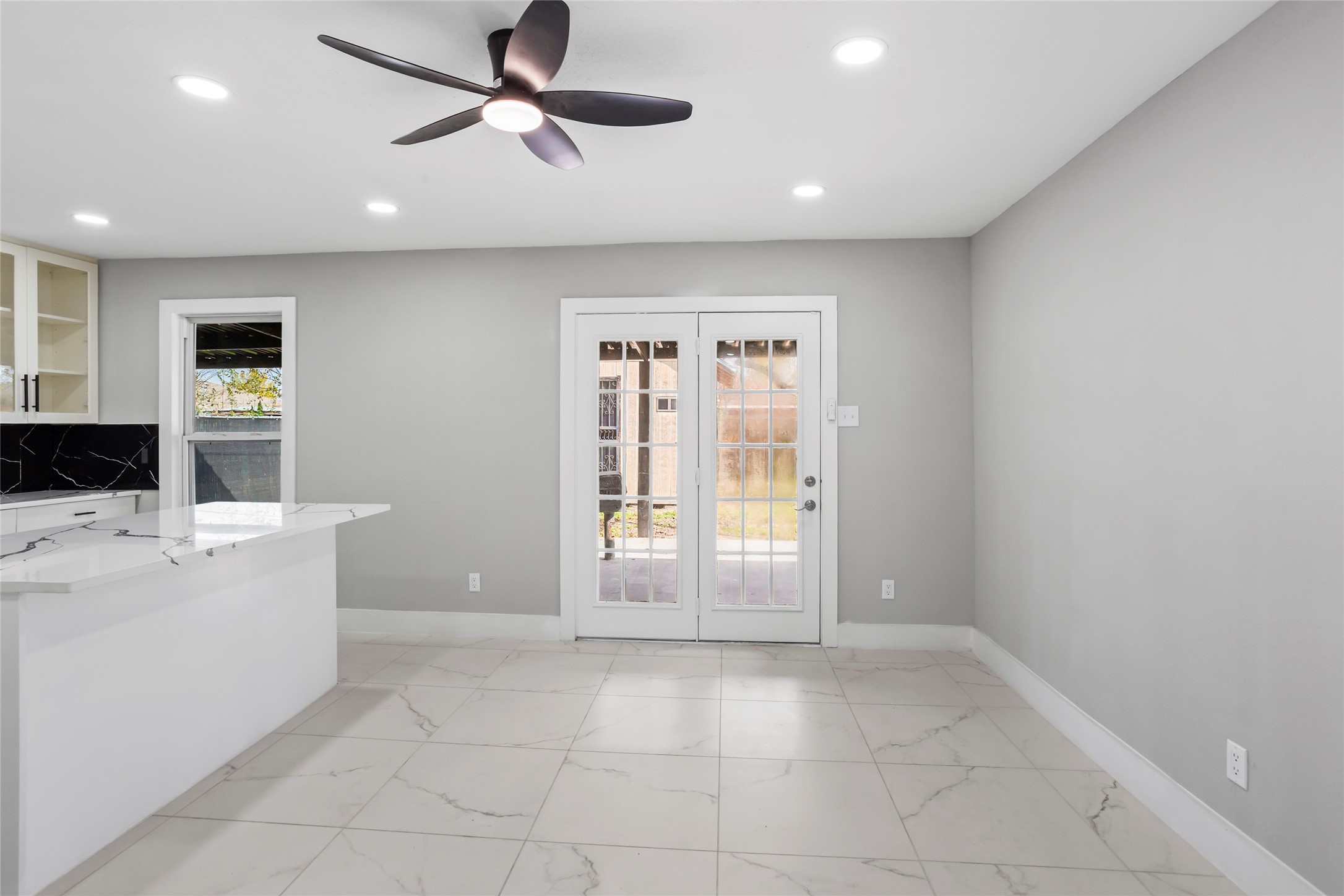 12707 Southbridge Road Houston, TX 77047 - Photo 10 of 23 a view of an empty room with a window