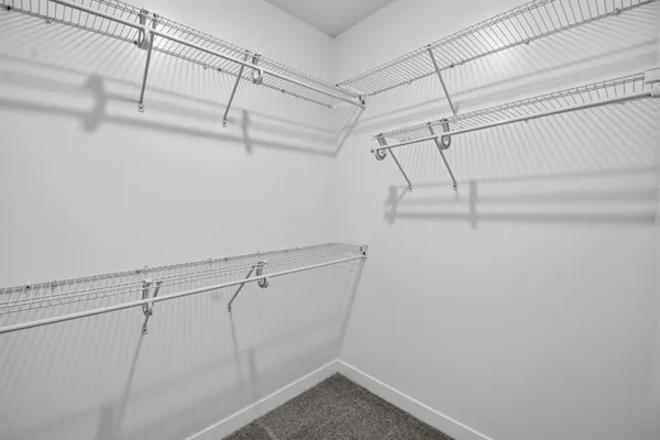 a view of a room with racks on the wall