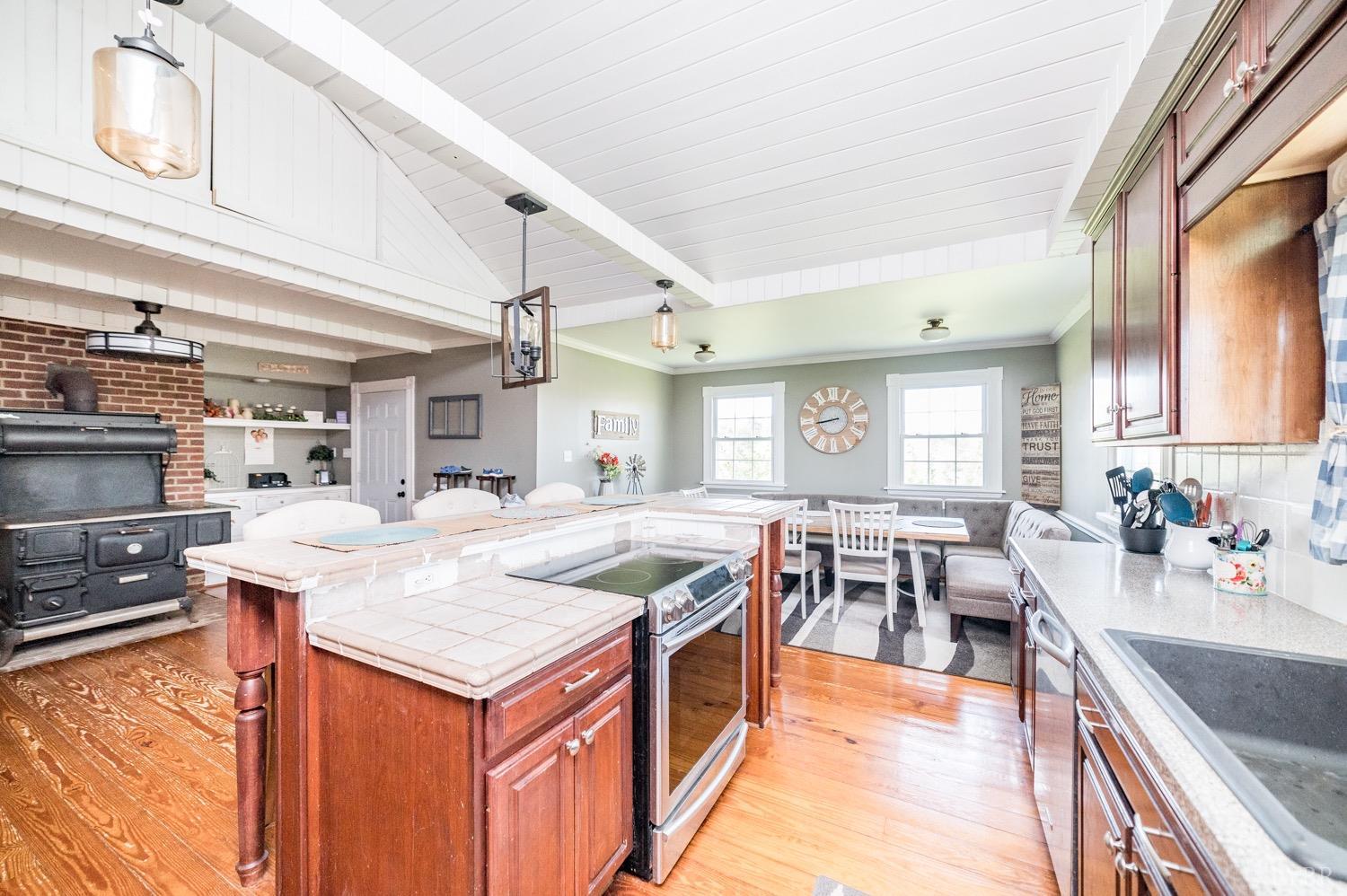 1103 Manley Branch Road Concord, VA 24538 - Photo 12 of 56 a kitchen with a stove and a refrigerator