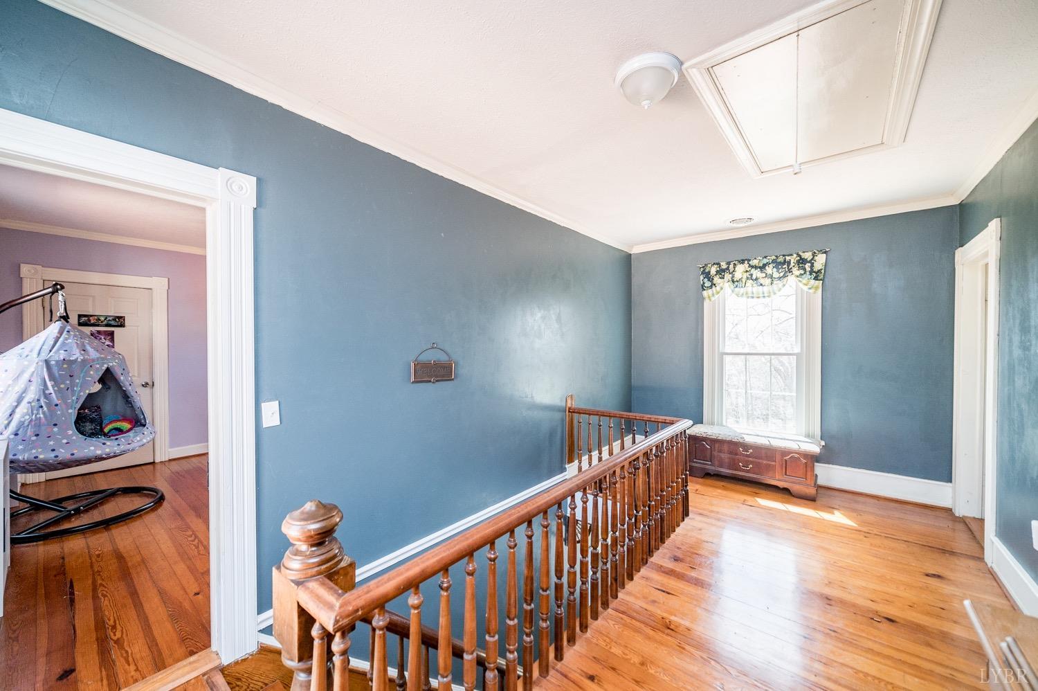 1103 Manley Branch Road Concord, VA 24538 - Photo 22 of 56 a view of a hallway to a livingroom with furniture