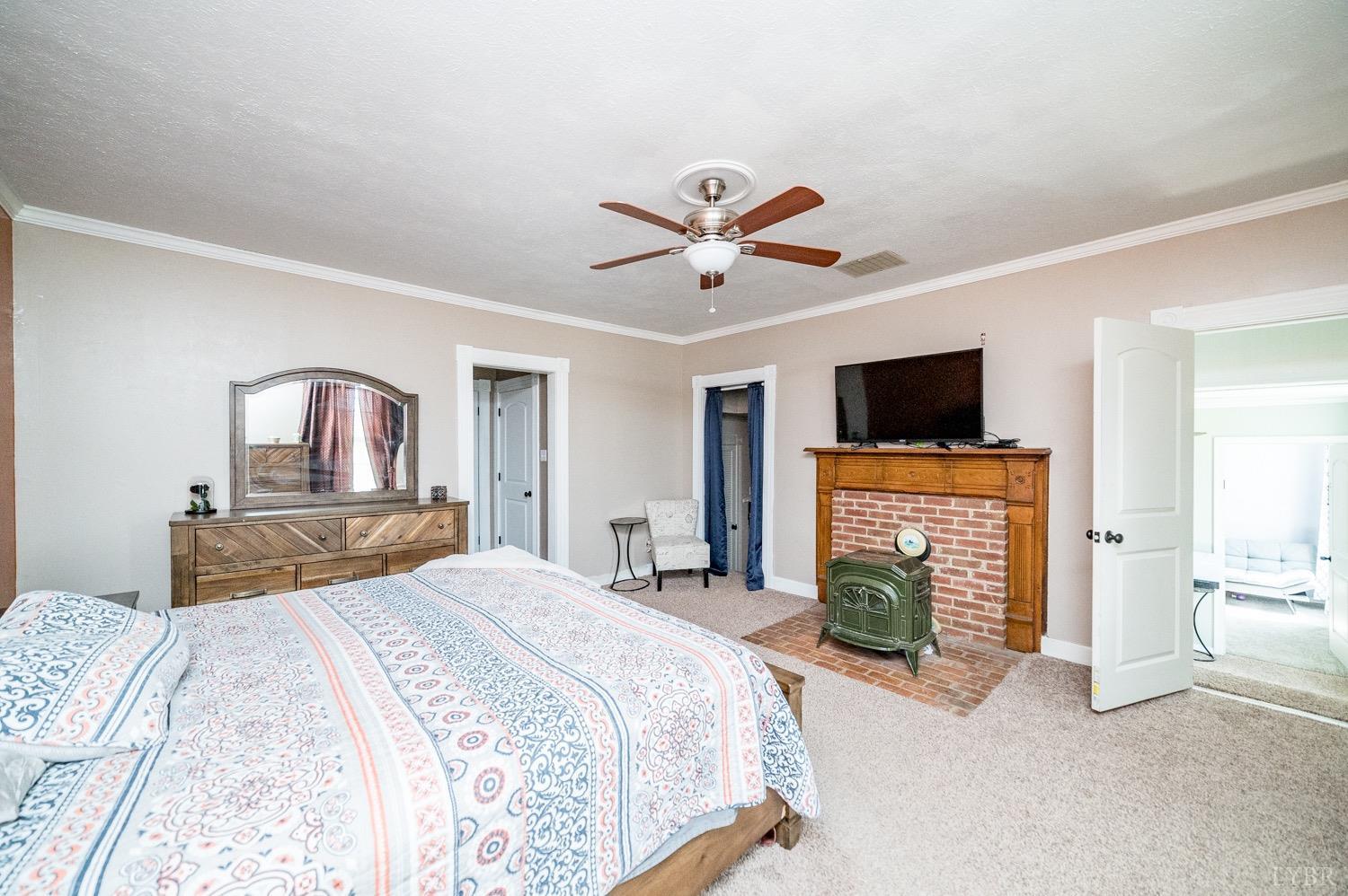 1103 Manley Branch Road Concord, VA 24538 - Photo 27 of 56 a bedroom with a bed and a flat screen tv