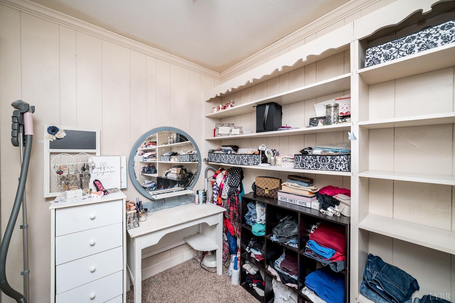 1103 Manley Branch Road Concord, VA 24538 - Photo 30 of 56 a view of walk in closet with clothes and shoes