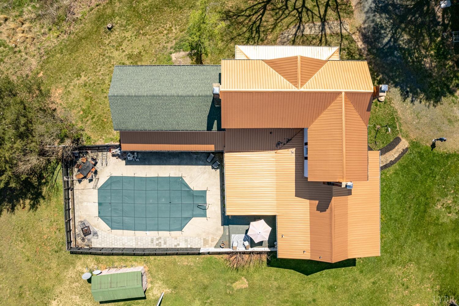 1103 Manley Branch Road Concord, VA 24538 - Photo 3 of 56 an aerial view of a house with a swimming pool