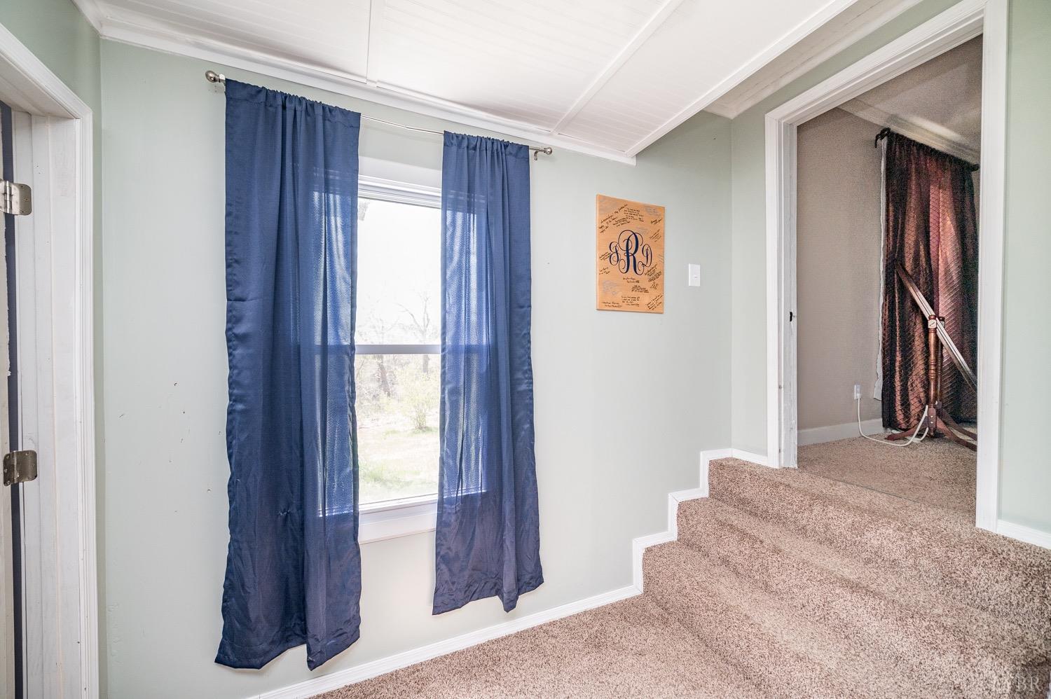 1103 Manley Branch Road Concord, VA 24538 - Photo 33 of 56 a view of a hallway with windows and closet
