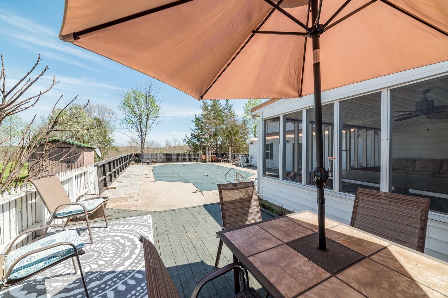 1103 Manley Branch Road Concord, VA 24538 - Photo 43 of 56 a patio with a table and chairs