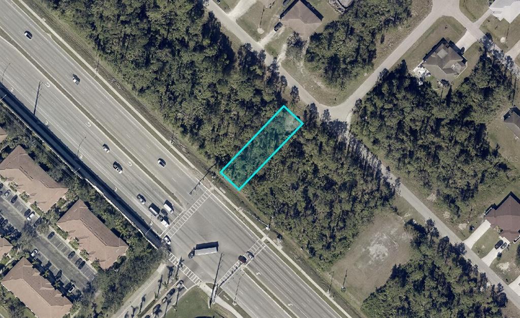 152 Meadow Road Lehigh Acres, FL 33973 - Photo 1 of 1 a view of a backyard with wooden fence