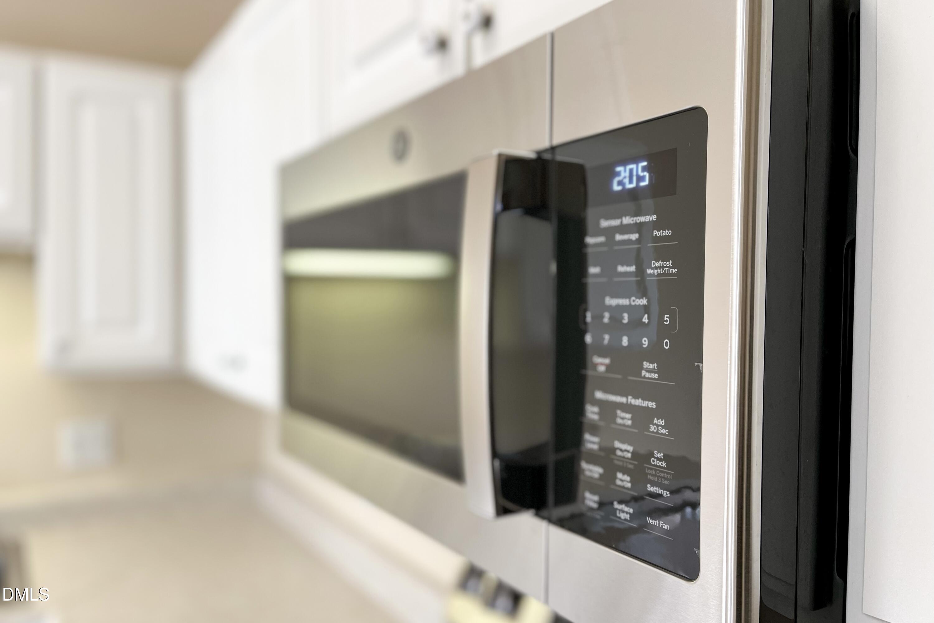 2521 Friedland Place, Unit 201 Raleigh, NC 27617 - Photo 11 of 34 a bathroom with a glass shower door and a window