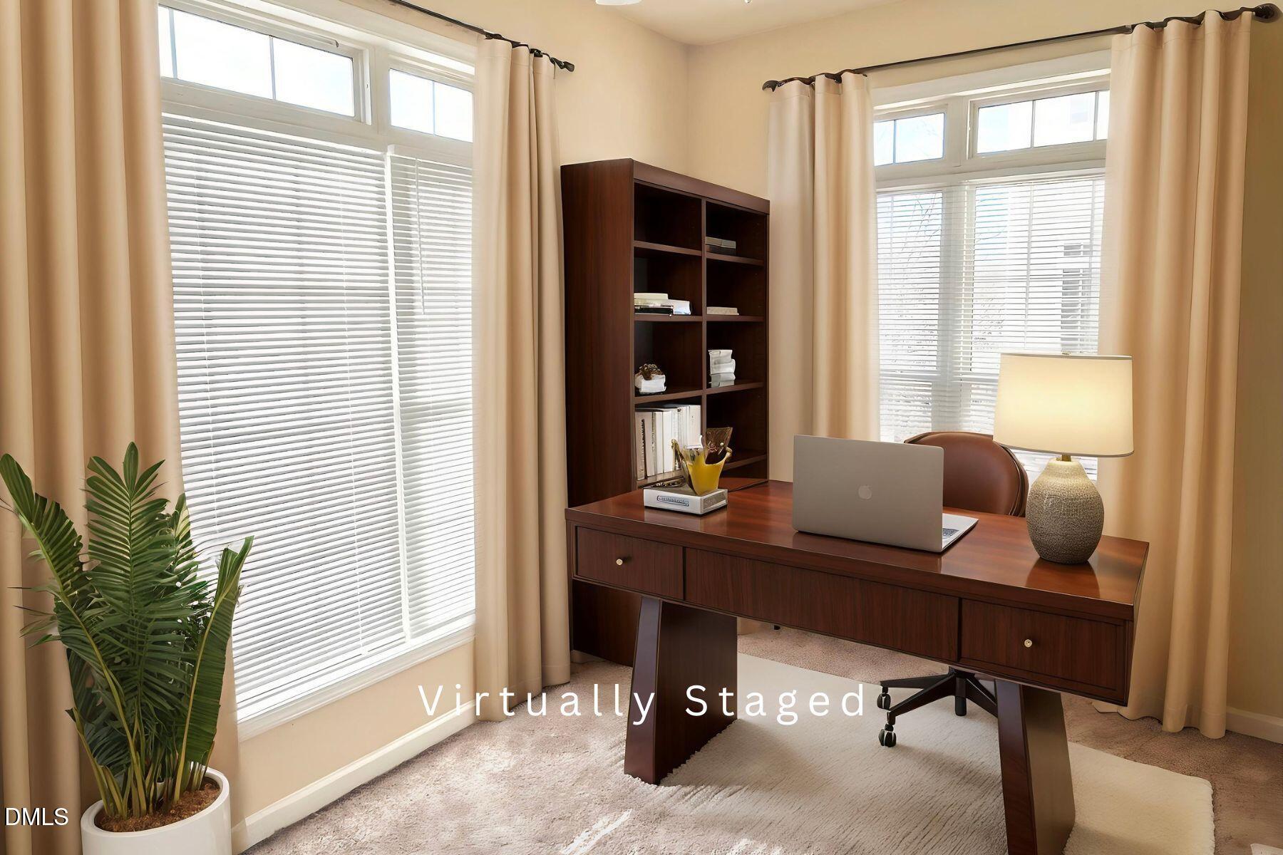 2521 Friedland Place, Unit 201 Raleigh, NC 27617 - Photo 2 of 34 a view of a workspace with furniture and a window