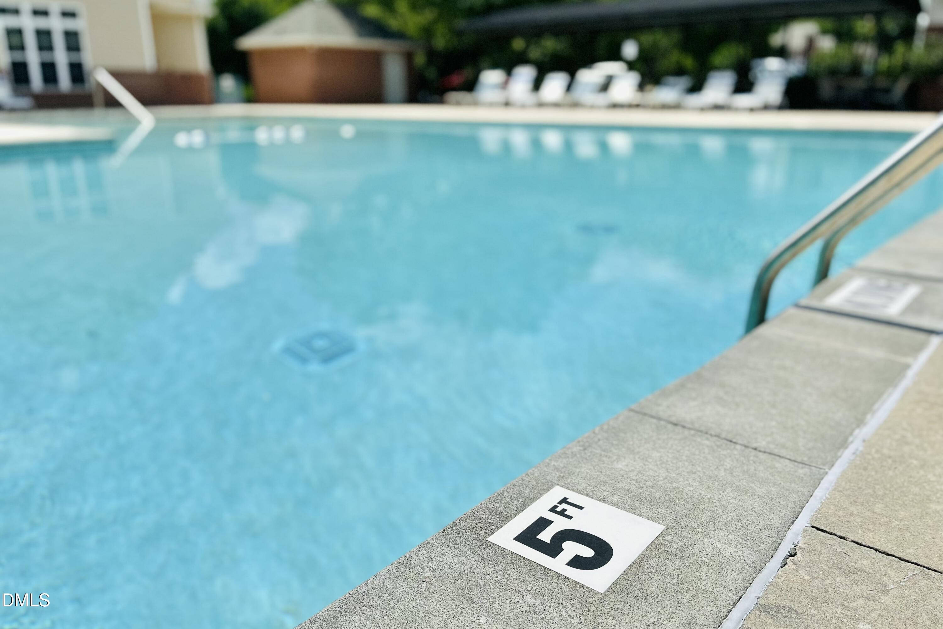 2521 Friedland Place, Unit 201 Raleigh, NC 27617 - Photo 27 of 34 a view of swimming pool with a yard