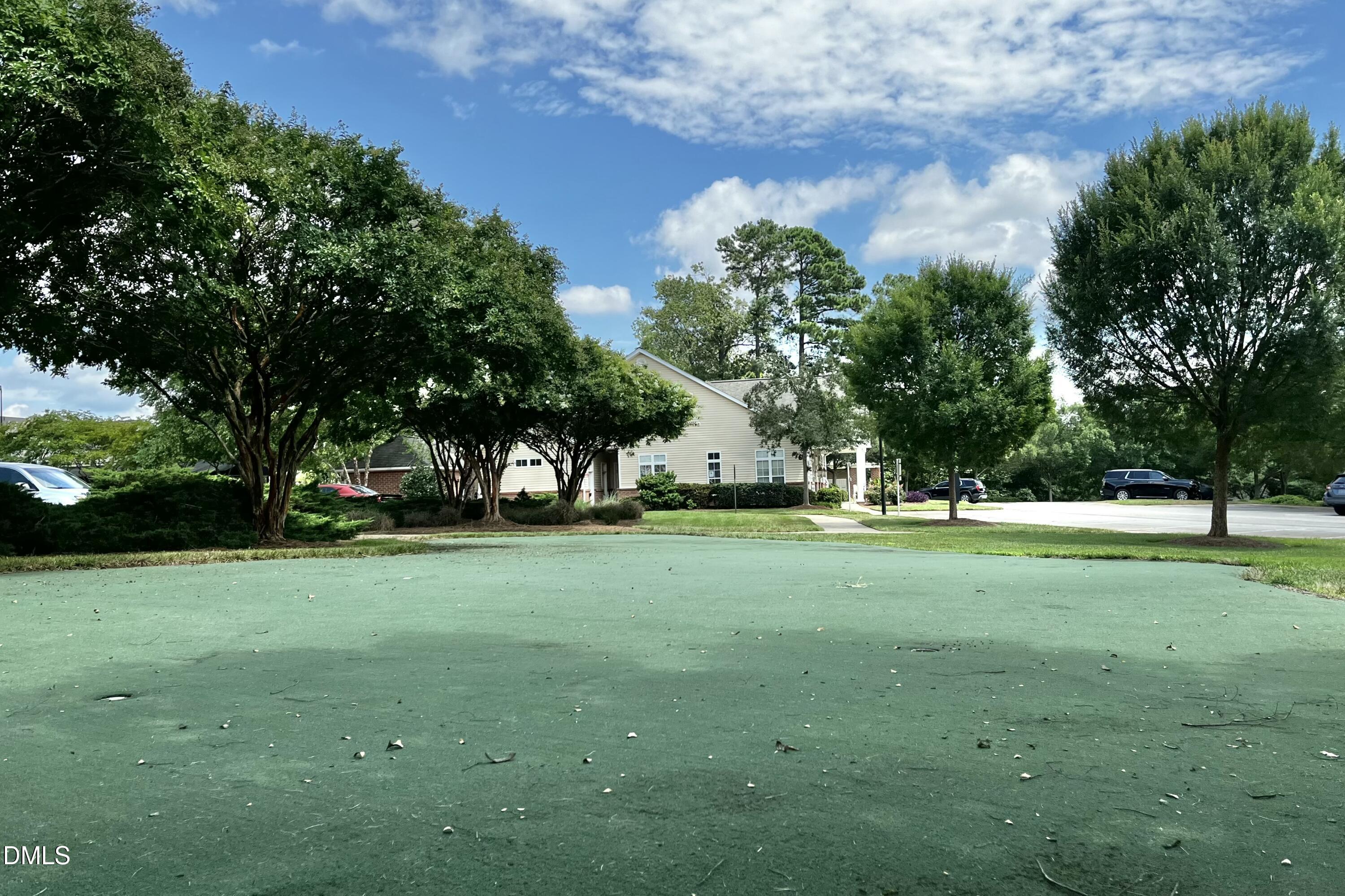2521 Friedland Place, Unit 201 Raleigh, NC 27617 - Photo 30 of 34 a view of a trees in a yard