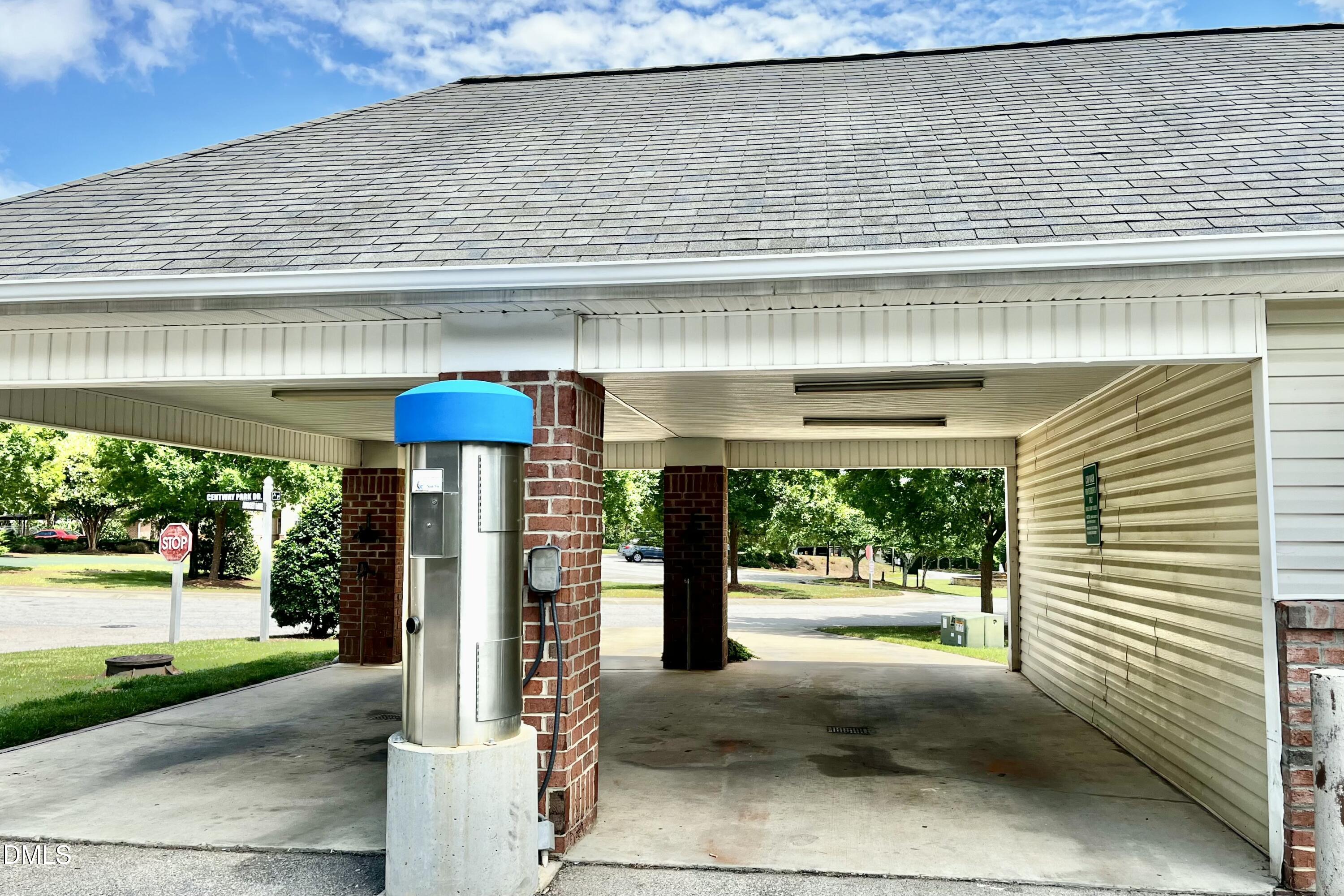 2521 Friedland Place, Unit 201 Raleigh, NC 27617 - Photo 31 of 34 a front view of a building with porch