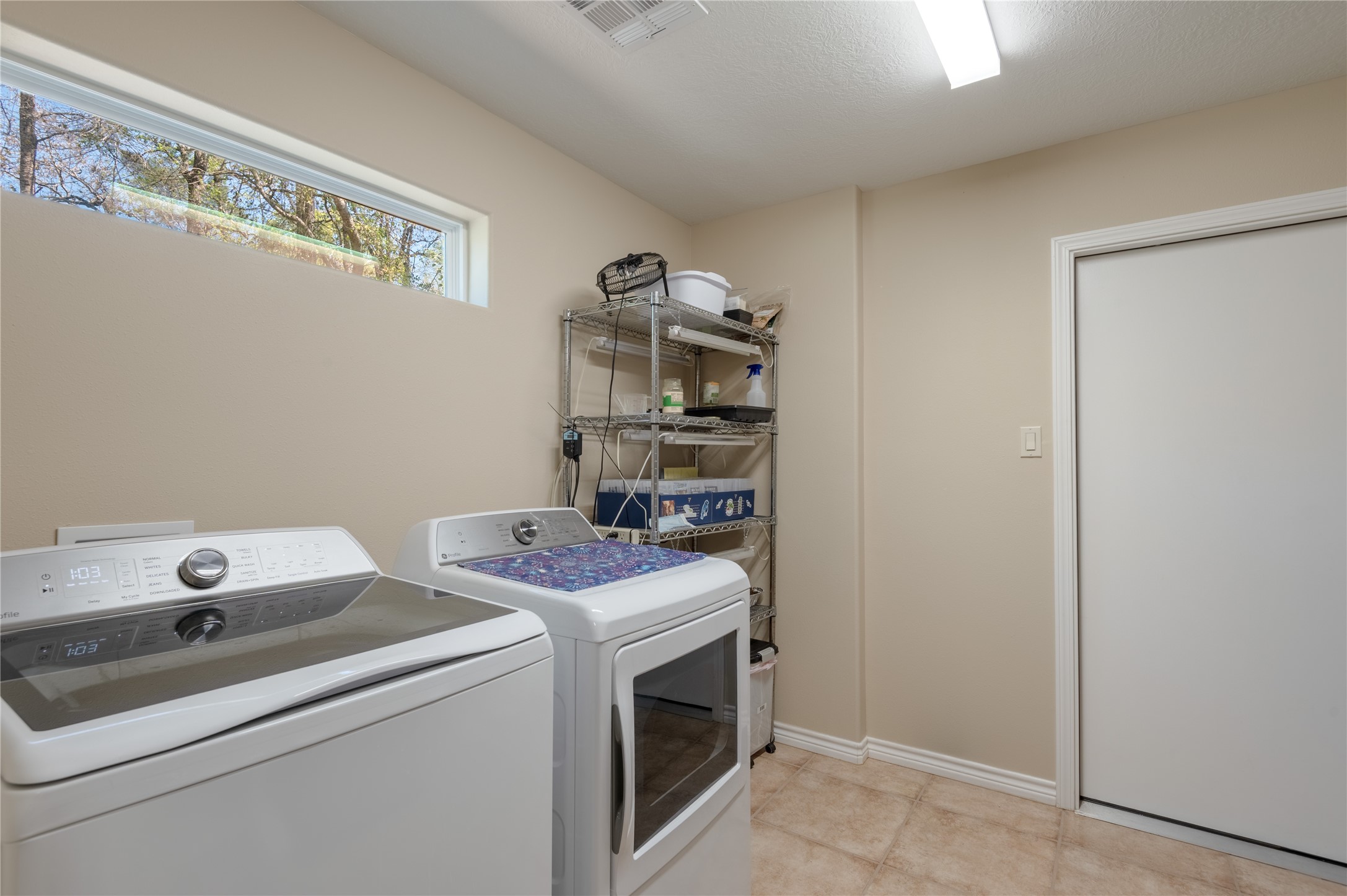 1533 Kickapoo Road Groveton, TX 75845 - Photo 15 of 50 a utility room with dryer and washer