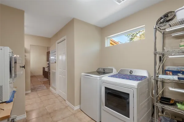 a en suite bathroom with a double vanity sink double and mirror