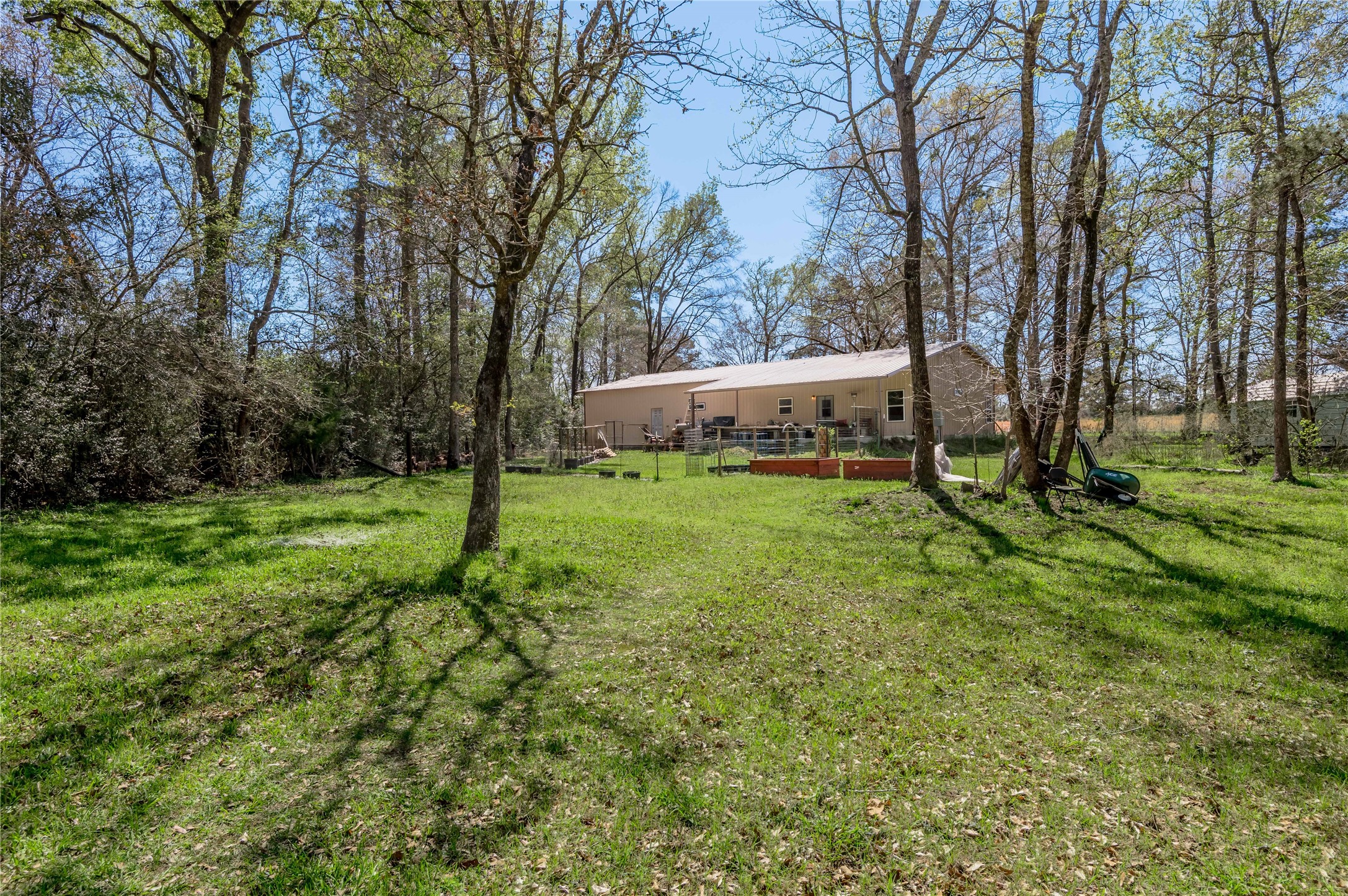 1533 Kickapoo Road Groveton, TX 75845 - Photo 45 of 50 a view of a house with a yard