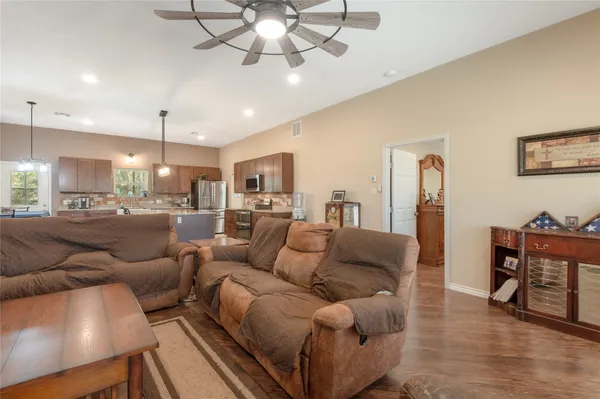 a kitchen with lots of counter top space and appliances