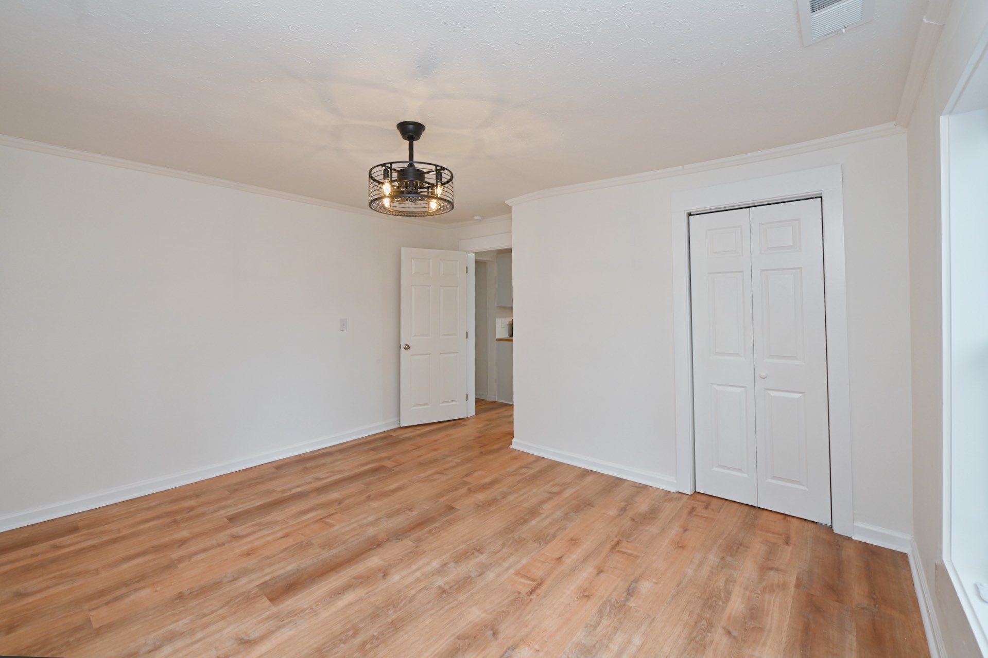 116 North Walnut Street Springfield, TN 37172 - Photo 9 of 17 a view of an empty room with wooden floor