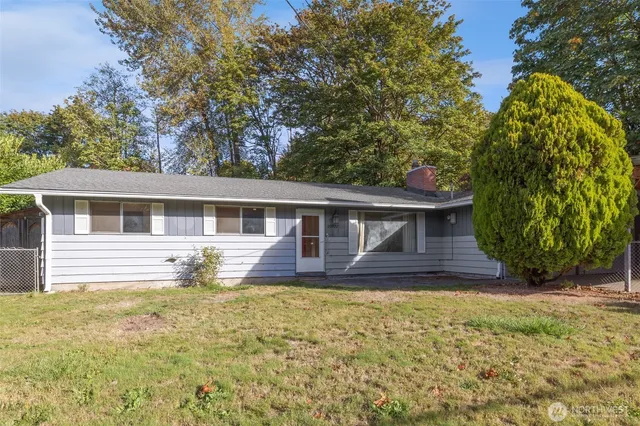a front view of house with yard