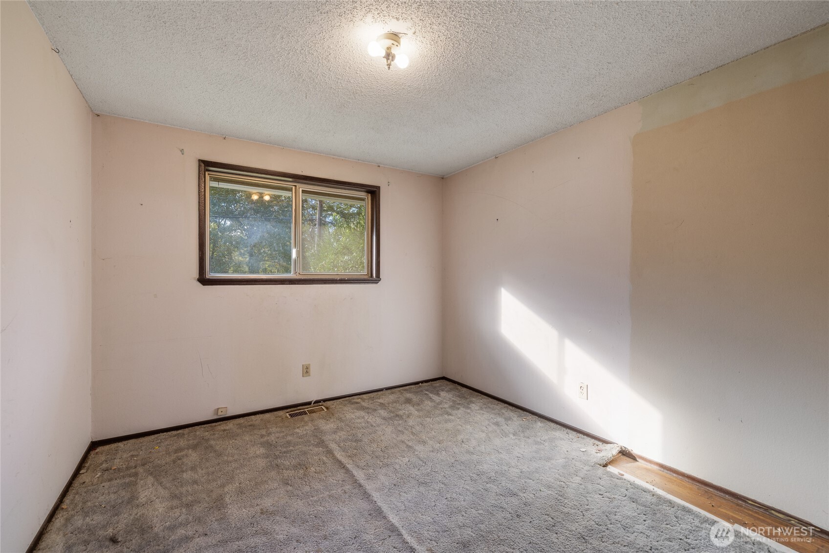 20822 Southeast 271st Street Covington, WA 98042 - Photo 3 of 30 an empty room with windows