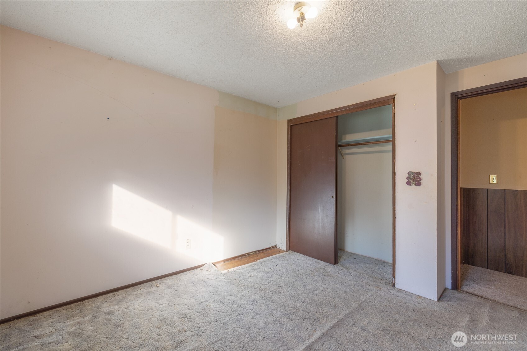 20822 Southeast 271st Street Covington, WA 98042 - Photo 4 of 30 an empty room with windows and closet